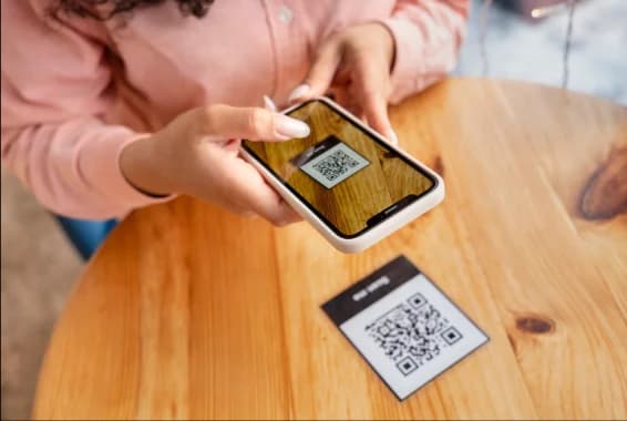Girl scanning qr code