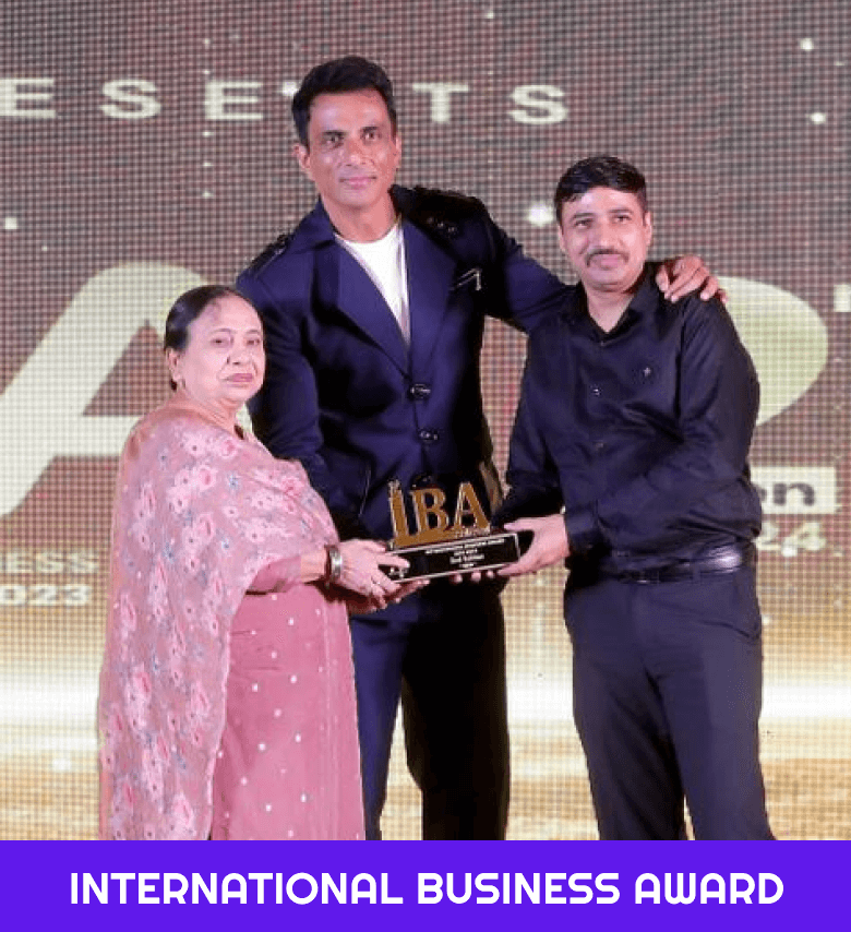 Deepak Dhingra receiving the International Business Award from actor Sonu Sood